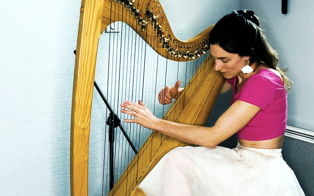 Tamsin Dearnley playing the harp. Photo credit Trevor Fountain
